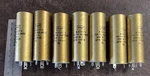 Lot Of Vintage Cde Cornell-dubilier AA0317A Gold Capacitors 100-160 Mfd Nos. Fixed Price $79.00.